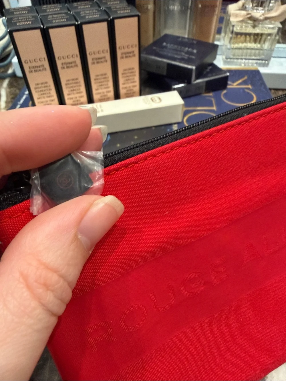 CHANEL Red Logo Zip Pouch